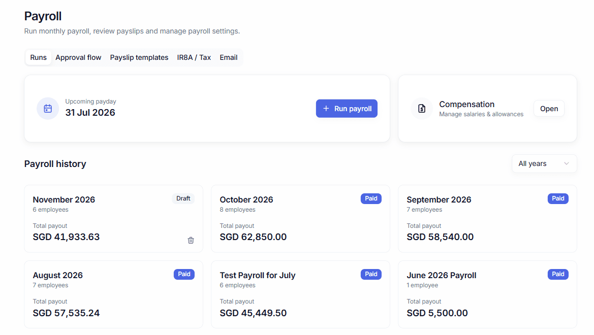 Payroll history: past runs as cards showing headcount, total payout and draft or paid status.